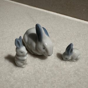 Porcelain bunny figurines.
